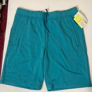 All in motion Size Medium soft gym drawstring waist teal 9”shorts Made in Jordan